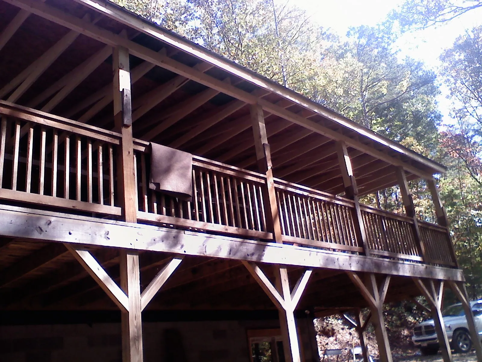 Timber framing under a new elevated porch and deck — Roof Leak Repair in Haines by Roofing Brothers